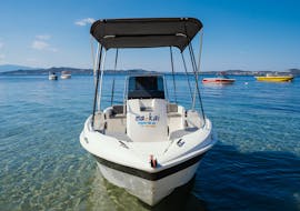 One of the boats you can rent during the Boat Rental in Ouranoupoli (up to 5 people) without Licence with Poseidon Watersports Ouranoupoli.