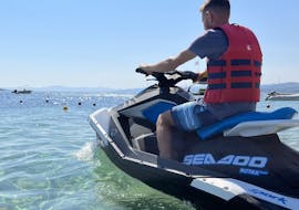 A young man on a jet ski during the Jet ski in Ouranoupoli with Poseidon Watersports Ouranoupoli.