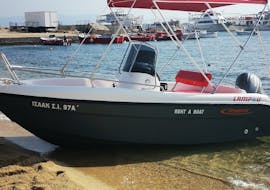 The boat is on the beach during the Boat Rental in Ouranoupoli (up to 6 people) without Licence with Rent a Boat Lampou.