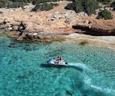 A young girl on the jet ski during the Jet Ski at Ammoudi beach in Agios Nikolaos with Amoudi Watersports.