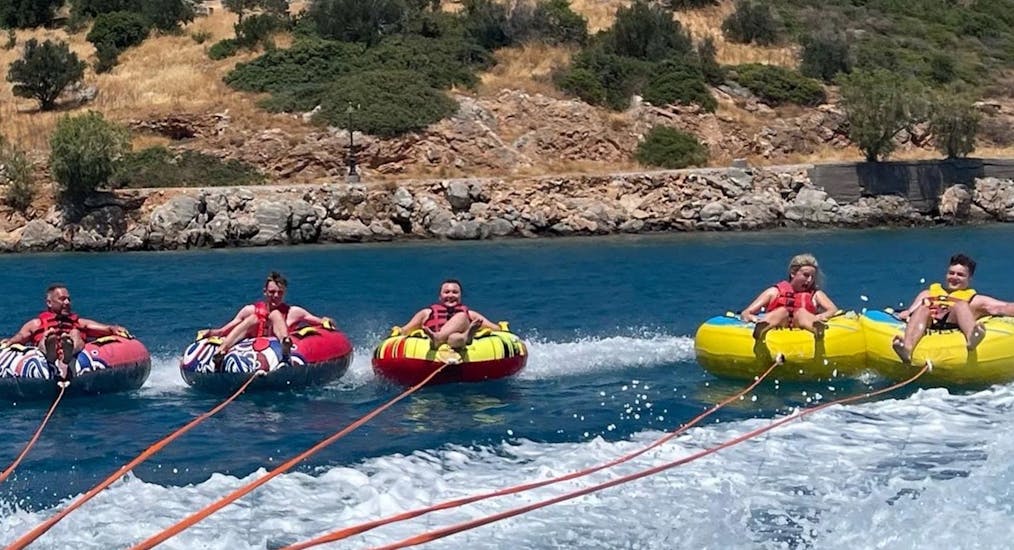 Going at full speed on the rings during the Crazy Sofa, Rings & Sliders Rides at Ammoudi Beach with Amoudi Watersports.