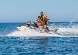 Two young men are smiling on the jet ski during the Jet Ski in Bali on Crete with The Skippers Bali.