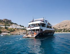 The boat "Discovery" near Lindos during the Full-Day Boat Trip to Lindos with Swimming with Rizos Cruises Rhodes.