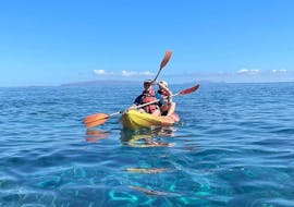 Two people on the kayak during the Kayak Tour to the Natural Reserve of Garajau in Madeira with Snorkeling with Lokoloko Madeira.