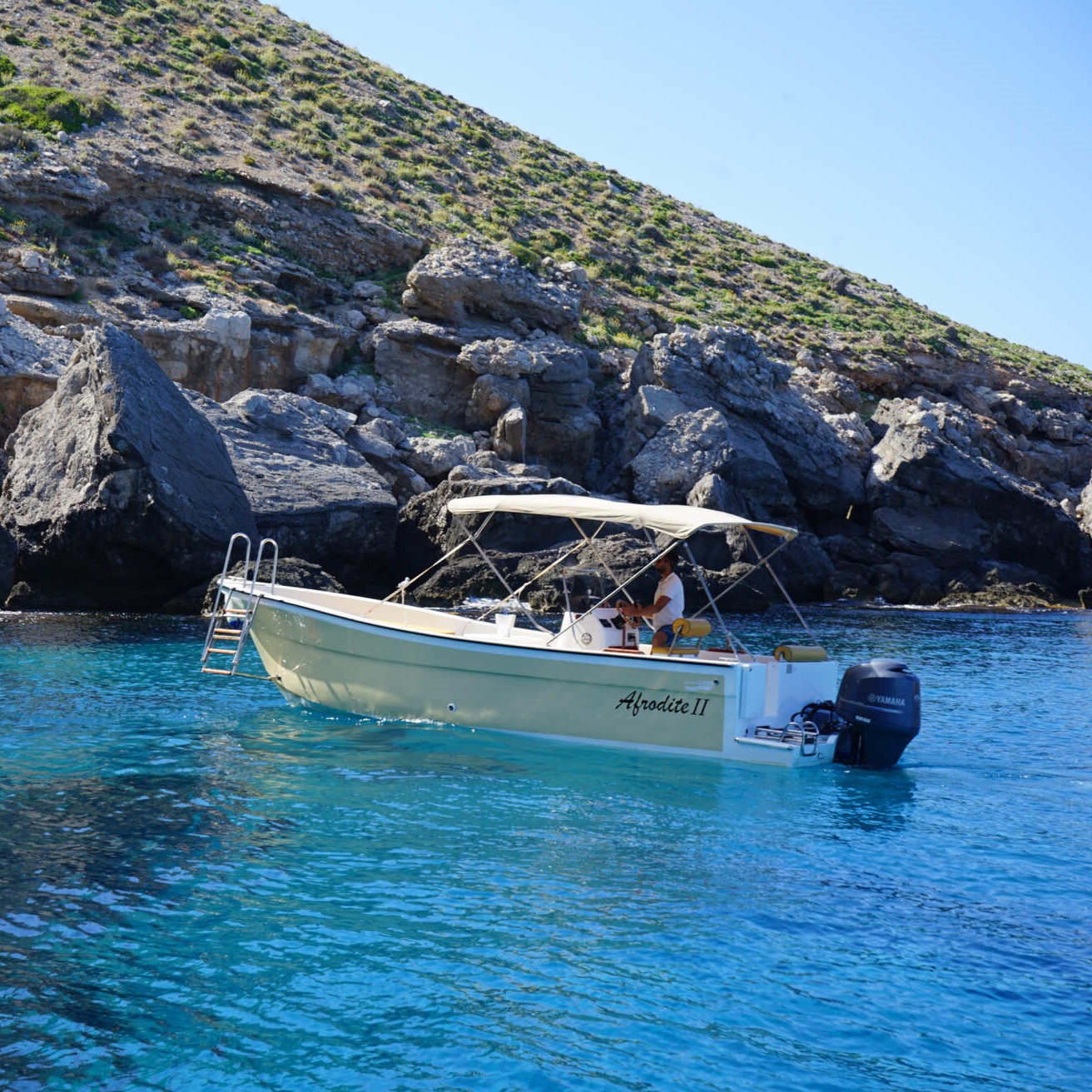 View of the Afrodite boat used for the Boat Trip from Marettimo to Favignana and Levanzo with Swimming Stops with Aegates Rent Boat Marettimo.