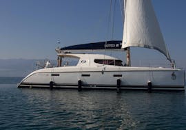 Catamaran used during Catamaran Trip around Milos with Snorkeling with Trinity Yachting Milos.