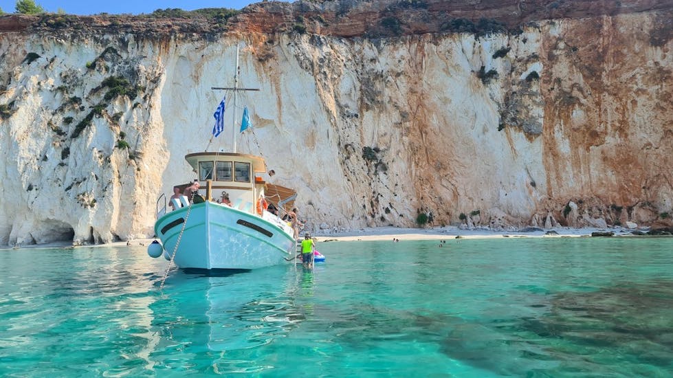 Dreamy Cruises boat standing in front of the White Rocks Beach during their boat trip around Kefalonia with traditional Greek lunch & snorkeling.