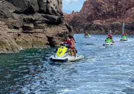 Several people are exploring the region during the Jet Ski Safari to Girolata & Scandola Nature Reserve from Cargèse with Fun Jet Location Cargèse with Fun Jet Location Cargèse.