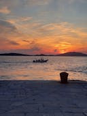 Sunset Boat Trip around Šibenik to the islands of Prvić Luka and Tijat from Adria Tours Vodice.