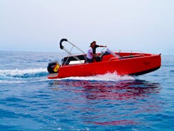 A RIB boat navigating during a boat rental in Torrevieja (up to 8 people) with Licence with Adventure Boat Torrevieja.