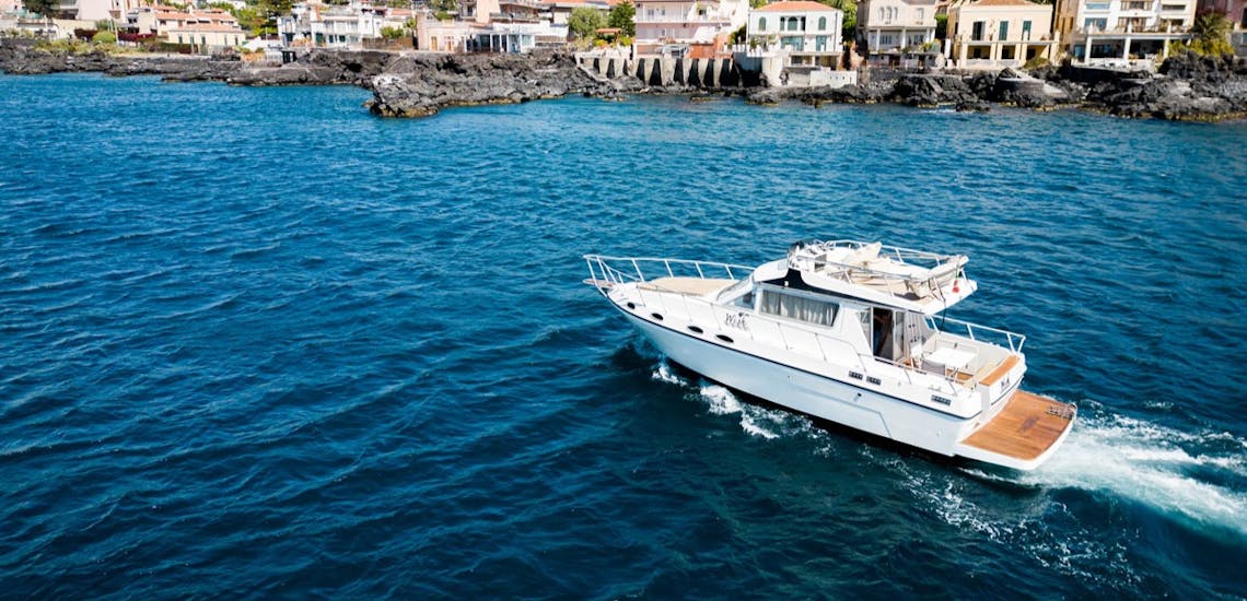 The boat Wish used during the Private Boat Trip from Catania to the Cyclops Islands with Apéritif with Wish Boat Rent Catania.