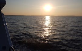 The sun setting on the private sailing boat trip to Blue Lagoon and Syvota with snorkeling with Pegasus Cruises.