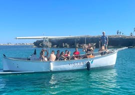 The boat of Victory Noleggi Marzamemi used during the Private Boat Trip from Marzamemi to Punta Cirica with Swimming Stops.