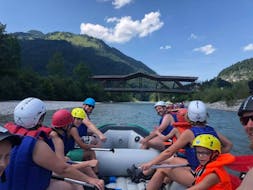 A group in their raft during Action Rafting on the Kitzbüheler Ache with Der Guide Brixtental.