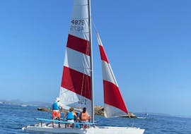Image of one of Wet4fun's catamaran sailing boats on a 5-person rental in Es Pujols for people with a sailing licence.