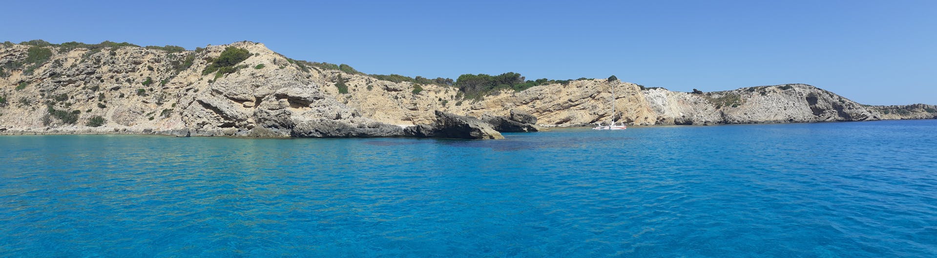 The views you can see during a private catamaran trip from Fornells along the North Coast of Menorca with open bar with Katayak Menorca.