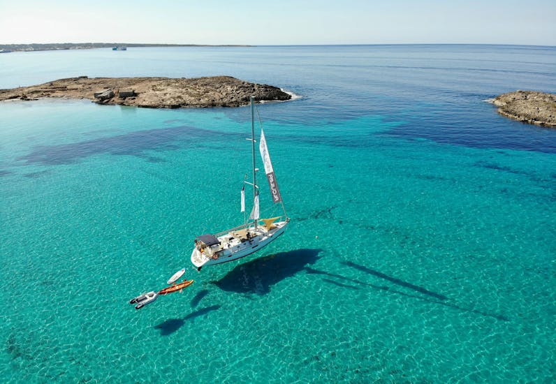 One of the boats of NavegaMed navigating during a Private Sailing Boat Trip from Santa Pola to Tabarca Island with Snorkeling.