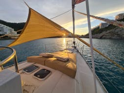 The private sailing boat trip of NavegaMed Santa Pola during sunset from Santa Pola to Tabarca Island.