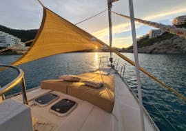 The private sailing boat trip of NavegaMed Santa Pola during sunset from Santa Pola to Tabarca Island.