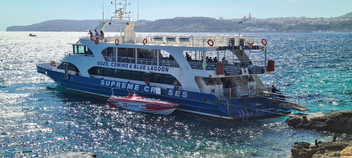 View of the boat of Supreme Travel during the boat Trip around Gozo, Comino and Blue Lagoon with Swimming stop.