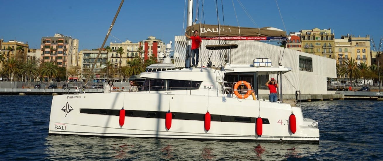 The catamaran from Sailing Experience Barcelona during the departure for Private Catamaran Trip in Barcelona with Sunset Option.