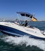The Quicksilver 535 boat during a rental in La Pobla de Farnals, Valencia (up to 6 people) with Licence from Low Cost Charter Pobla de Farnals.