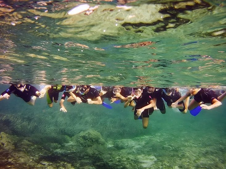 A group of a snorkeling Trip in the Addaia Port in Menorca with Blue Dive Menorca.