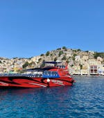 View on the red boat in the port during the Boat Trip to Symi Island with Swimming Stop from Rhodes Sea Lines.