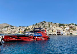 View on the red boat in the port during the Boat Trip to Symi Island with Swimming Stop from Rhodes Sea Lines.