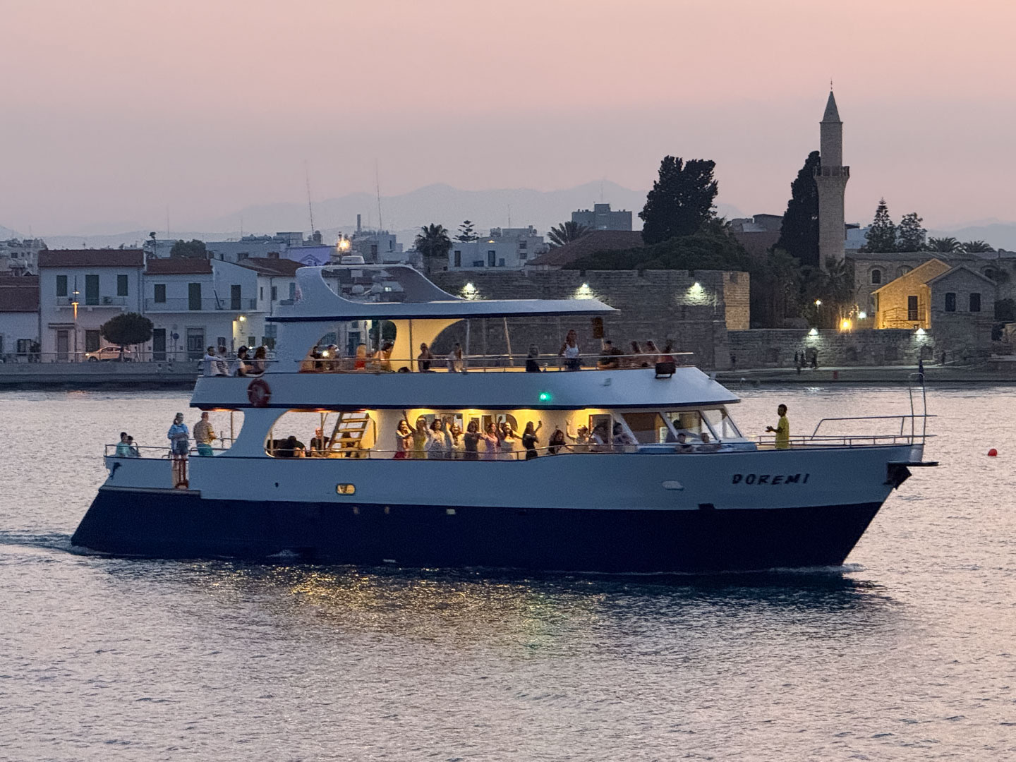 Sunset Glass-Bottom Boat Trip from Larnaca to Mackenzie Beach with Music and Wine from Larnaca Napa Sea Cruises.