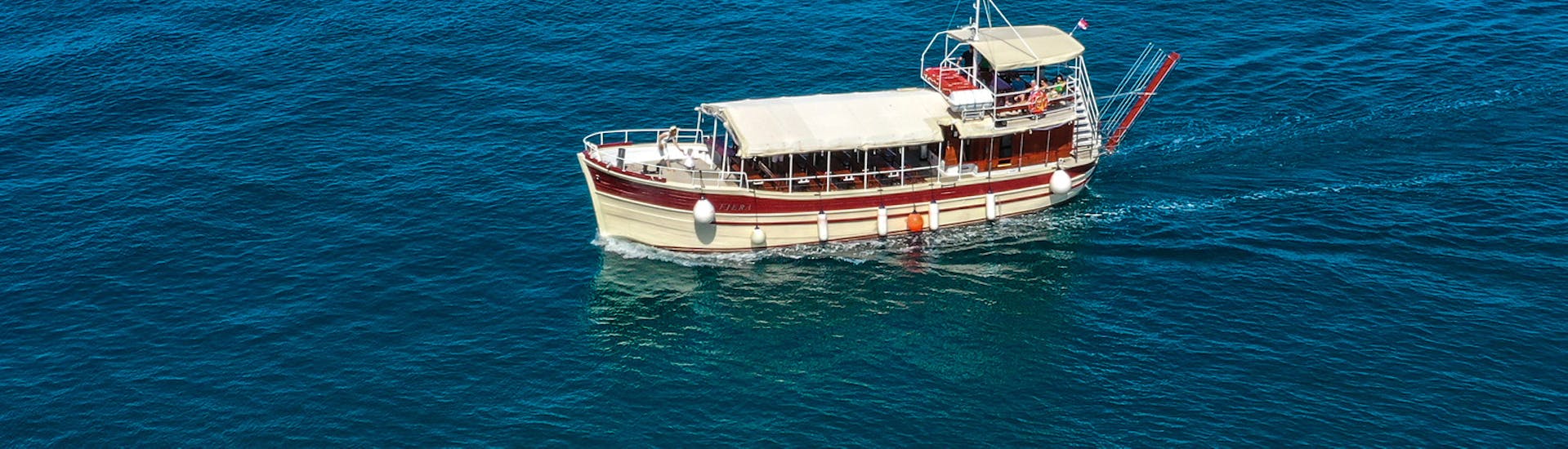 Gita in barca da Parenzo (Poreč) con visita turistica.