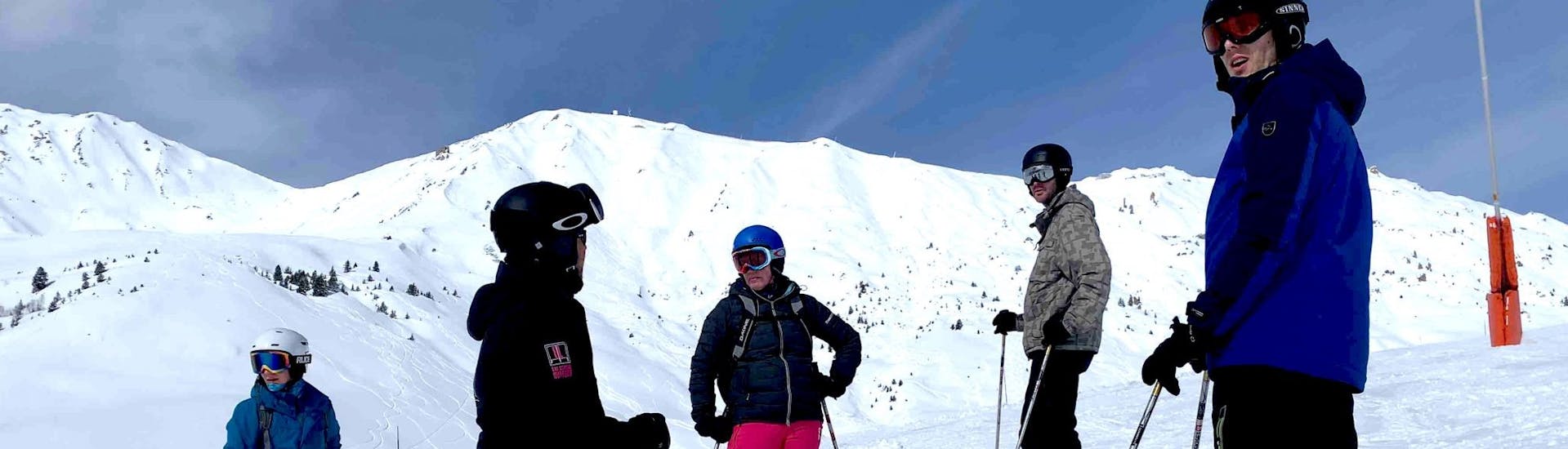 A group doing Private Ski Lessons for Adults - Plagne Centre Ski School ELPRO La Plagne.