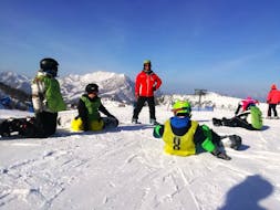 Private Snowboarding Lessons for Kids (7-12 y.) of All Levels from Scuola Sci Piani di Bobbio.