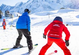 An adult learning how to ski during Adult Ski Lessons (from 13 y.) of All Levels from ESF Les Houches.