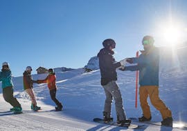 Cours particulier de snowboard dès 7 ans avec École suisse de ski et snowboard Arosa.