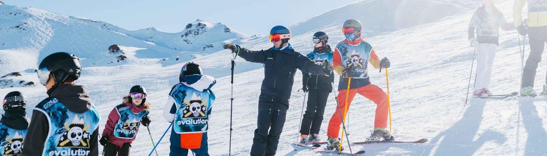 Group of kids doing Kids Ski Lessons (from 6 y.) for Experienced Skiers from Evolution 2 Saint-Gervais.