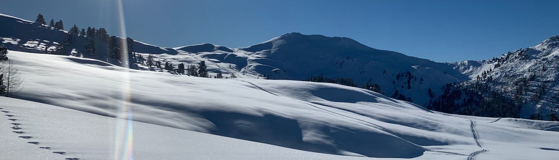 Die verschneiten Berge von Annaberg während dem Privaten Skikurs für Erwachsene aller Levels.