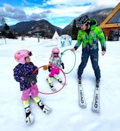 Clases de esquí para niños a partir de 3 años para debutantes con Scuola di Sci Evolution 3 Lands Tarvisio.