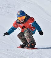 Lezioni private di snowboard per tutte le età e livelli con Scuola di Sci Level Up Campo Felice.