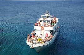 Big group of people having fun during their Afternoon Boat Trip to Cape Greco & Blue Lagoon from Protaras & Pernera from Aphrodite I Cruises Cyprus.