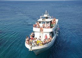 Big group of people having fun during their Afternoon Boat Trip to Cape Greco & Blue Lagoon from Protaras & Pernera from Aphrodite I Cruises Cyprus.