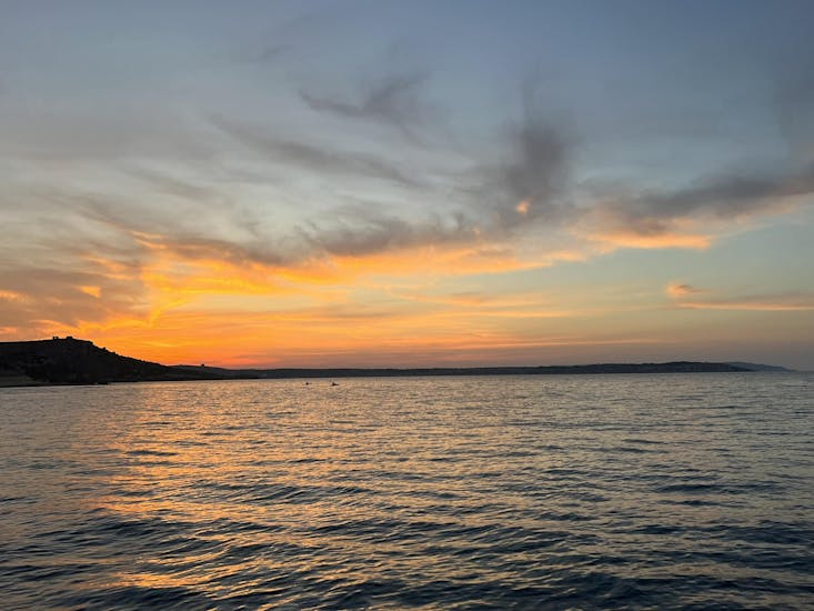 Gita in barca al tramonto alla Blue Lagoon e alla Laguna di Cristallo con soste per nuotare.