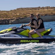 A couple does a Jet Ski Safari around the 3 Cities & Grand Harbour in Valletta from SIPS Watersports Malta.