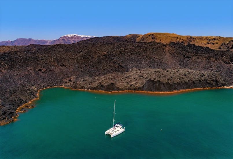Private Full Day Catamaran Trip to the Santorini Islands with BBQ & Open Bar.