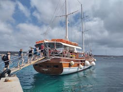 People getting on board before the start of the 3 Bay Boat trip to Blue Lagoon, Crystal and Halfa Rock Bay with Snorkeling from Oh Yeah Malta.