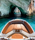 A picture of a luxurious motor boat during the Private Boat Trip to Turtle Island and Keri Caves with Snorkeling from Mistral Rentals Zakynthos.