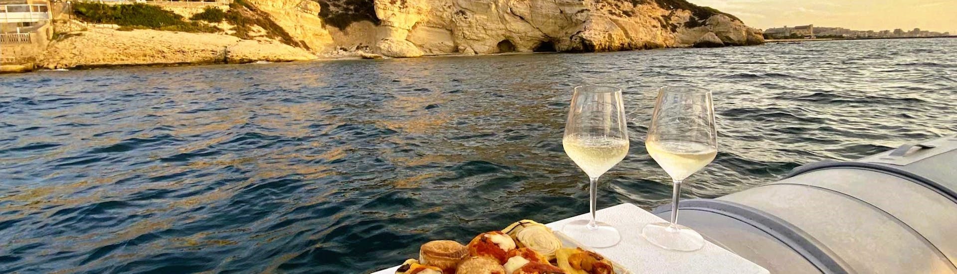 Sunset Boat Trip along the Coast of Cagliari with Apéritif
