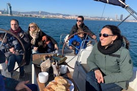 Group sitting on a sailing boat in Barcelona with CatVents