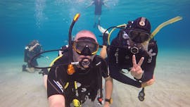 Two divers during PADI Open Water Diver Course for Beginners in Latchi from Latchi Dive & Watersports Centre.