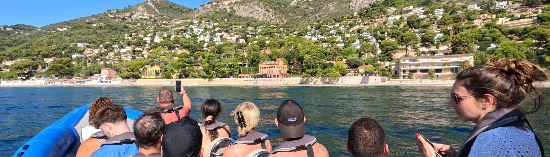 Group of people having fun during their Nissa Croisières' RIB Boat Trip to Saint-Jean-Cap-Ferrat and Monaco from Nice with Snorkeling.